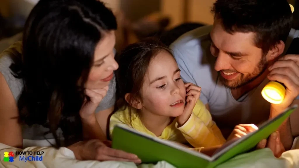 A smiling mother and father cuddle up in bed with their young daughter, reading a bedtime story together. The warm glow of a flashlight adds a cozy atmosphere, reinforcing the benefits of a calming bedtime routine for children with autism and ADHD. Shared reading time helps ease transitions and promotes relaxation before sleep. The "How to Help My Child" logo is visible in the corner.